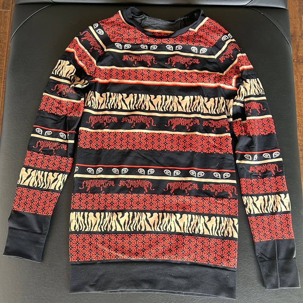 Size S Sweaty Betty Ski Skin/long underwear. Orange, black & tan tiger pattern.